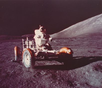 null NASA. Apollo 17 mission. Astronaut Eugene Cernan aboard the lunar vehicle during...
