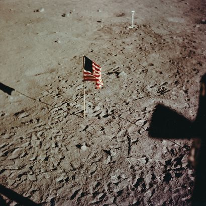 null NASA. Apollo 11, July 20, 1969. The American flag, the first human flag planted...