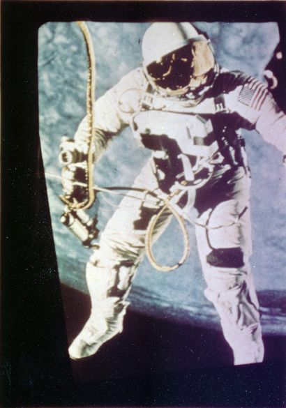NASA. Astronaut Ed. White floats in space...
