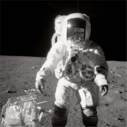 null Large format. Apollo 12. Lunar Module Pilot Alan L. Bean poses next to a scientific...