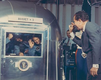 null NASA. Apollo 11. Historical view of the Apollo 11 crew meeting inside its quarantine...