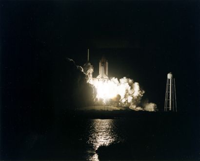 null NASA. Night takeoff of the space shuttle Discovery, mission STS-56, April 8,...