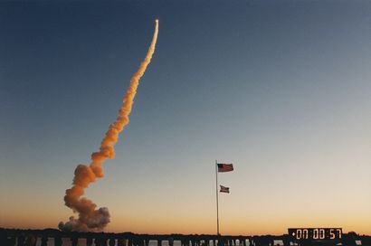 null Nasa. 57 seconds after liftoff the space shuttle Discovery (Mission STS-102)...
