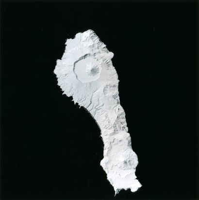 null NASA. A beautiful view from space of a huge iceberg floating on the sea. Circa...