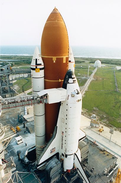 null NASA. Space shuttle ATLANTIS is positioned on top of the mobile launch pad on...