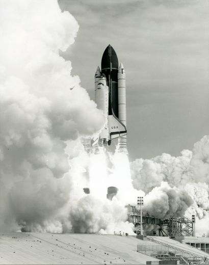 null The 41st space shuttle flight begins with a fanfare of spinning clouds, smoke...
