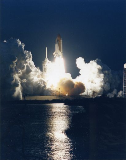 null Nighttime liftoff of Space Shuttle Discovery (Mission STS-60) on February 3,...