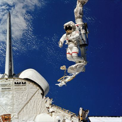 null Large format. Impressive spacewalk of astronaut Bruce McCandless positioned...