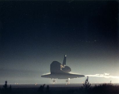 null Spectacular view of the silhouette of the space shuttle Discovery during its...
