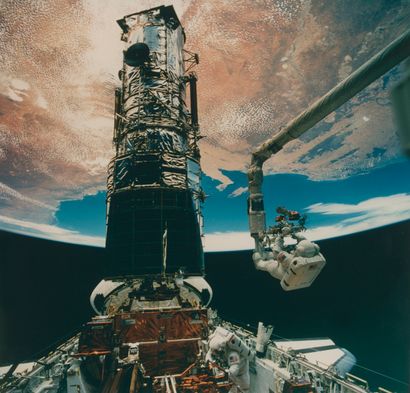 null NASA. First repair in earth orbit of the HUBBLE space telescope on December...