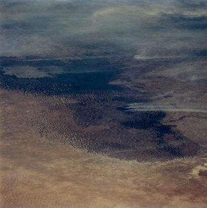 null NASA. View of the earth from the space shuttle (Lake Chad, Chad), 1994. Number...