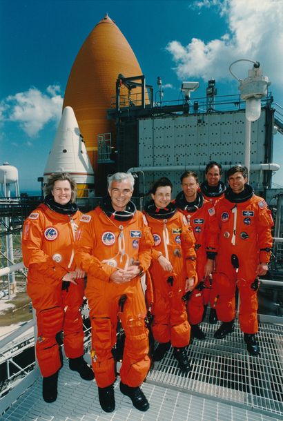 null Nasa. The crew of Space Shuttle Atlantis (Mission STS-76) stands in front of...
