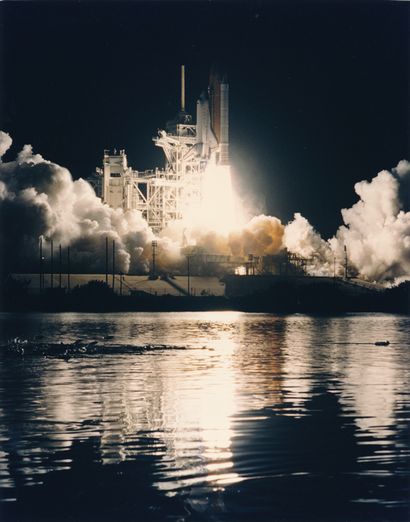null NASA. Nighttime liftoff of Space Shuttle Discovery (Mission STS-60) on February...