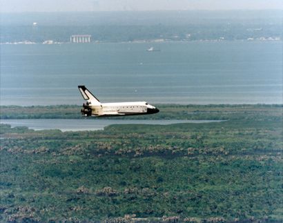 null Nasa. Space Shuttle COLUMBIA (Mission STS-90) hovers along the Indian River...