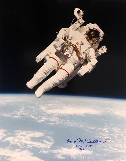 null NASA. LARGE FORMAT. Exceptional and rare photograph of astronaut BRUCE MC CANDLESS...