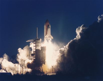 null NASA. Space shuttle Endeavour (Mission STS-88) takes off at night from launch...