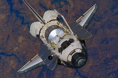 null NASA. Space Shuttle DISCOVERY (Mission STS-121). Space Shuttle Discovery approaches...