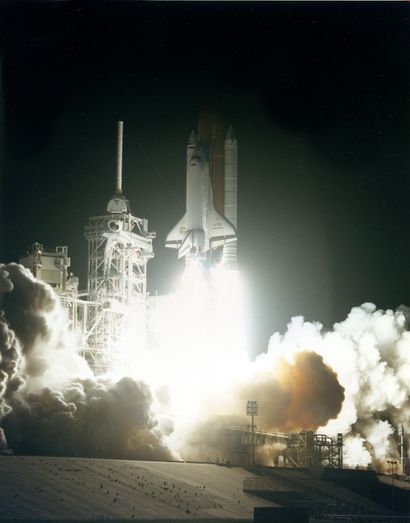 null NASA. Spectacular view of the nighttime liftoff of Space Shuttle Discovery,...