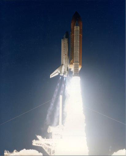 null Perfect profile liftoff of Space Shuttle Endeavour (Mission STS-77) on May 19,...