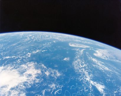 null Nasa. A beautiful view of the perfectly blue globe topped by the deep black...