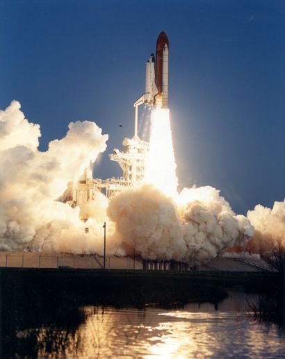 null Nasa. Perfect liftoff of Space Shuttle Discovery (Mission STS-39) in the early...