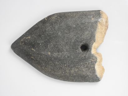 null Large axe with a hole in the blade made of amphibole or nephrite jade with remains...
