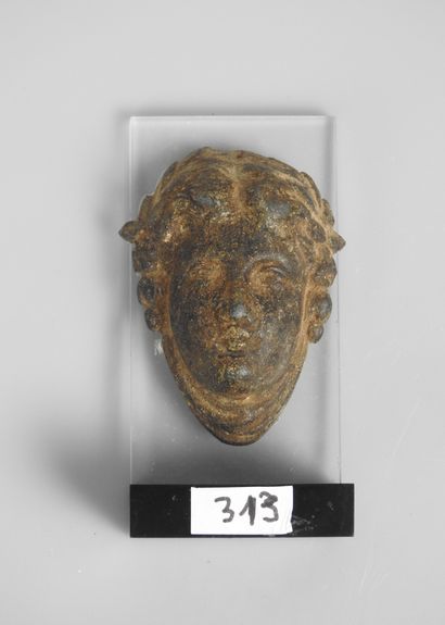 null Tête du Dieu Bacchus.Style romain.
Applique en bronze.H :5cm.