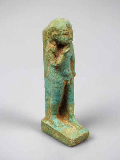 null Pharaoh's child god walking Harpocrates in frit or pâte de verre.9cm high.
