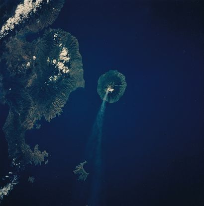 NASA NASA. Vertical observation of the erupting volcano "Gunung Api" on the island...