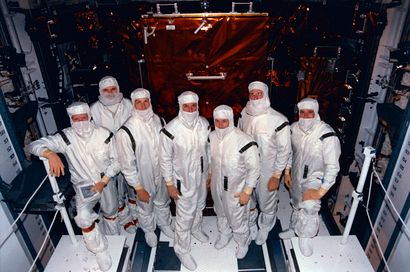 NASA NASA. The Space Shuttle DISCOVERY crew (Mission STS-82) pose in their sanitized...