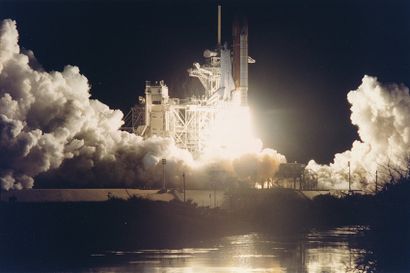 NASA NASA. A very nice photographic picture representing the night liftoff of the...