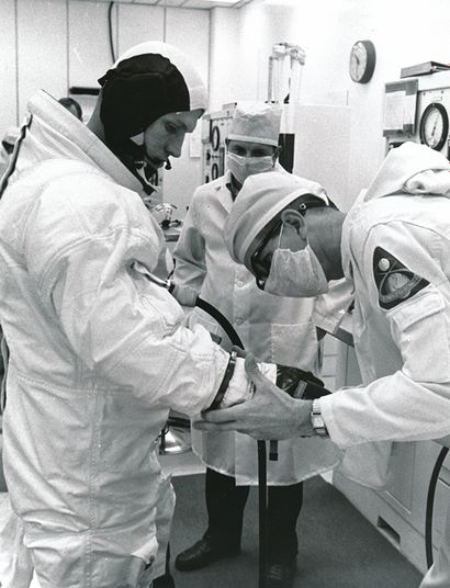 NASA NASA. Apollo 14 mission. Before boarding for the Moon, the astronauts put on...