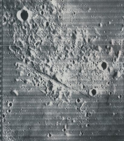 NASA NASA. View of the lunar surface by the Lunar Orbiter probe on October 6, 1966....