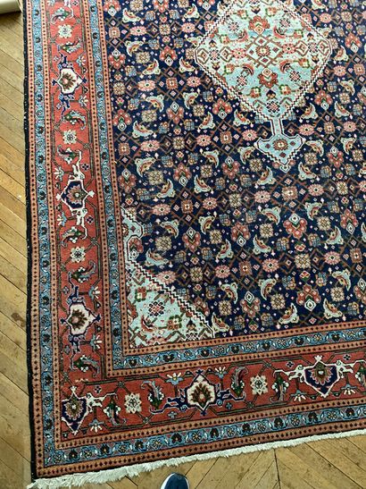 null Oriental carpet with blue background decorated with geometric, flowers and fruits,...