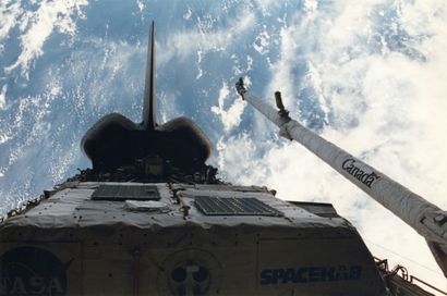 NASA Background view of the Earth from the payload bay of Space Shuttle Discovery...