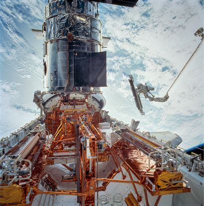 NASA NASA. LARGE FORMAT. Spectacular maintenance view of the HUBBLE space telescope....