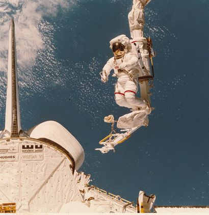 NASA Nasa. Mssion of the space shuttle STS 41-B. Astronaut Bruce Mc Candless moves...