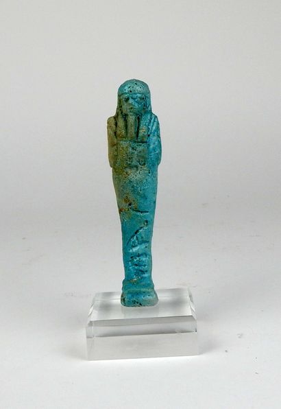 null Oushebti carrying farming tools

Blue frit 11.4 cm

Egypt Late Period XXVI-XXXth...