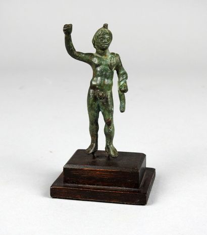 null Jolie statuette représentant un homme nu, la toge sur l'épaule, le bras levé

Ancienne...