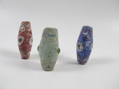 null Three beads with three symbolic ocelli. Glass paste with polychrome decoration....