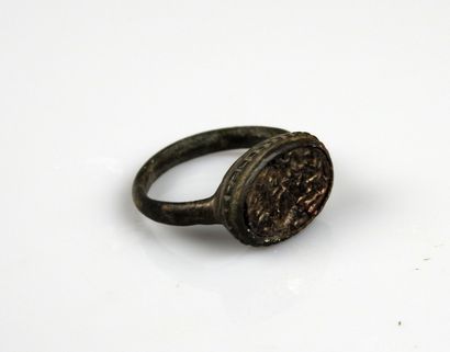 null A superb seal ring with intaglio decoration representing two horses facing each...