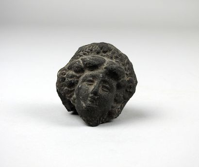 null Female head of a Greco-Roman deity, terracotta.

Greco-Roman style. Height :...