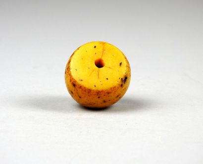 null Ancient bead of copal amber or of the same material.

Nomadic Tuareg people...