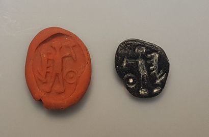 null Seal representing a man and a caprid

Glass paste 2.4 cm

Ancient Mediterranean...