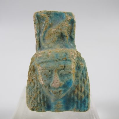null Two amulets, Udjat eye and goddess aegis. Blue glass paste and siliceous earthenware....
