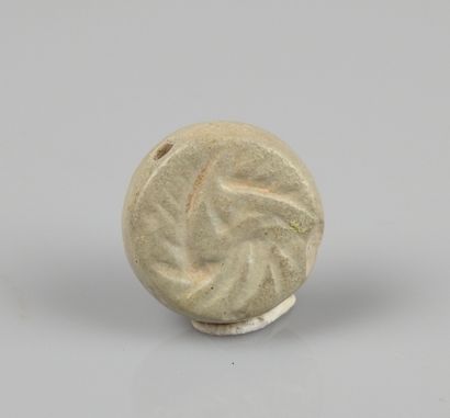 null Seal with geometric decoration

Stone 2 cm

2nd or 1st millennium BC
