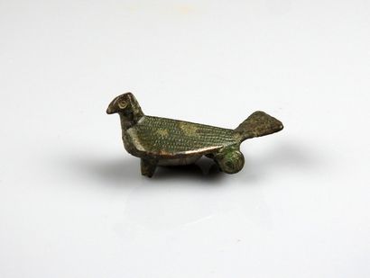 null Spring fibula representing a bird, the very fine body marked by small points

Old...