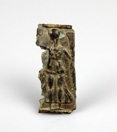 null Plaque representing a character on both sides, the legs stylized under the clothes

Bronze...