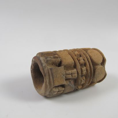 null Seal-cylinder, talisman of ritual tattooing. In beige and orange terracotta....