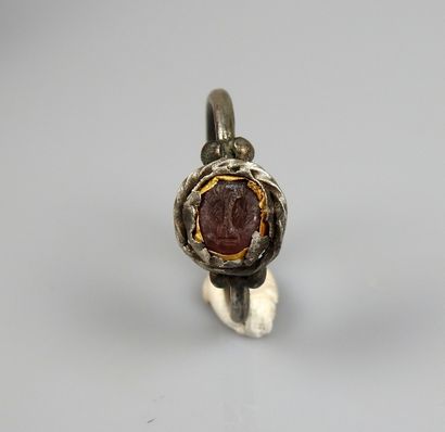 null Ring with intaglio decoration representing fishes in a cabochon and a ball ring

Silver...